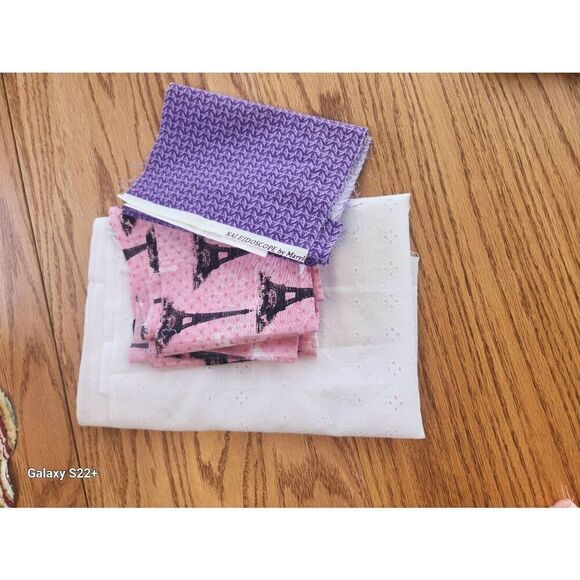 Three fabrics. pink Paris, eyelet, purple pattern - Picture 1 of 9